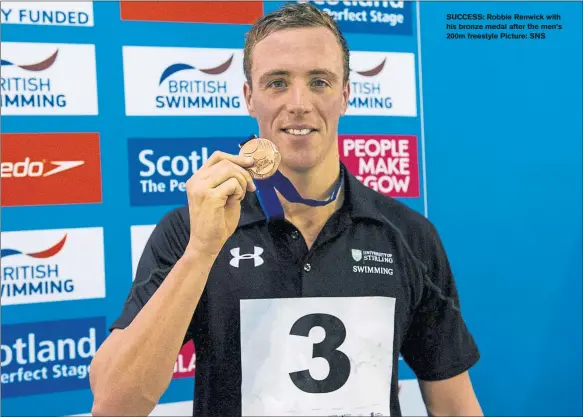  ??  ?? SUCCESS: Robbie Renwick with his bronze medal after the men’s 200m freestyle Picture: SNS