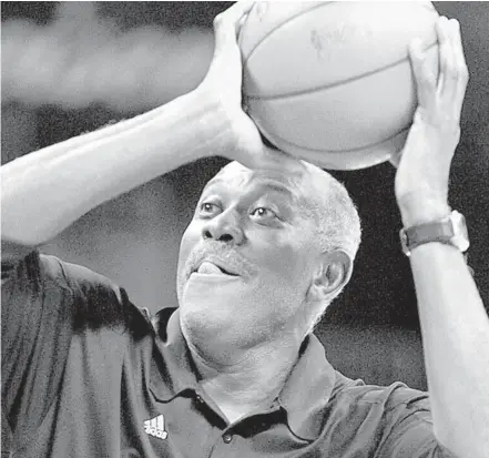  ?? MICHAEL LAUGHLIN/SUN SENTINEL ?? Former Heat assistant coach Bob McAdoo made the NBA’s 75th Anniversar­y team, with an assist from Heat coach Erik Spoelstra.