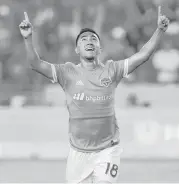  ?? Yi-Chin Lee / Houston Chronicle ?? Memo Rodriguez, a product of the Dynamo Academy, celebrates his first goal in league competitio­n and only the second by an academy graduate.