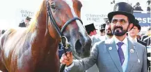  ?? WAM/Gulf News Archives ?? Shaikh Mohammad with Masar, who won the Epsom Derby for Godolphin in June this year.