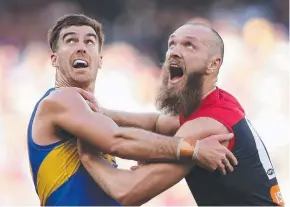  ??  ?? GRITTY: Eagles’ Scott Lycett and Demons’ Max Gawn contesting the ruck in Round 22.