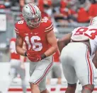  ?? ADAM CAIRNS/COLUMBUS DISPATCH ?? After spending his freshman season at linebacker, the 6-foot-4, 255-pound Cade Stover (16) moved to tight end before last season.