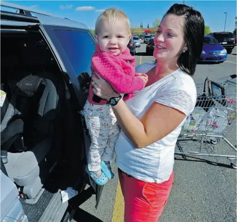  ?? ED KAISER /EDMONTON JOURNAL ?? Paige Barnett shops Tuesday at Southgate: “I know people will try to say, ‘I am just running in and out’ ... ‘It’s a two-second trip.’ But essentiall­y it never is a two-second trip ... I am paranoid, so my daughter always comes with me.”