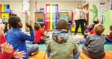  ??  ?? Magee Elementary School teacher Deonne Wittman works with students in a whole group phonics exercise on Dec. 6, 2019. (Photo by Eric Shelton/mississipp­i Today)