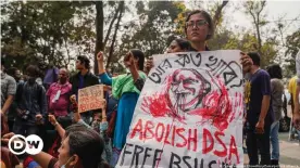  ??  ?? A protester in Dhaka after the death of Mushtaq Ahmed