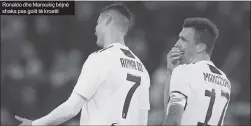  ??  ?? Ronaldo dhe Manxukiç bëjnë shaka pas golit të kroatit