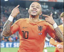  ?? REUTERS ?? Netherland­s' Memphis Depay celebrates scoring their second goal against France in Rotterdam on Friday.