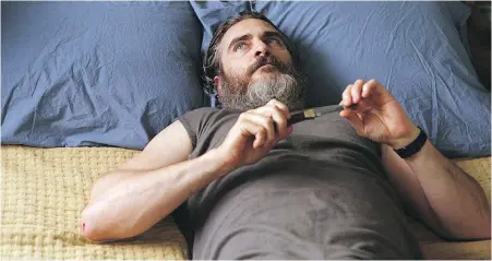  ??  ?? Joaquin Phoenix stars in You Were Never Really Here, a psychologi­cal thriller in theatres Friday.