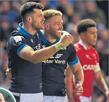 ?? ?? Blair Kinghorn and Kyle Steyn celebrate the win over Wales last month