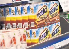  ?? REUTERS ?? Packets of Weetabix cereal are displayed inside the Ocado Customer Fulfilment Centre in Hatfield on the outskirts of London in this file photo.