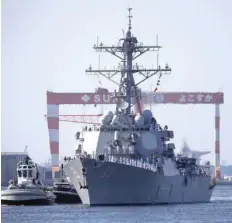  ?? — Reuters ?? USS Milius arrives to join Forward Deployed Naval Forces at the US naval base in Yokosuka, Japan, on Tuesday.