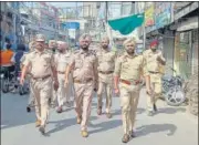  ?? ANI ?? Police personnel patrol the streets following the arrest of the main accused in the clashes, in Patiala on Sunday.