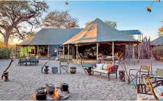 ??  ?? The Duke and Duchess of Sussex met on a blind date at Dean Street Townhouse, left, and later spent time at Meno a Kwena, in Botswana, above, the book says. Top, the couple at Bondi beach, in 2018