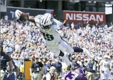  ?? Weston Kenney/Associated Press ?? DeMarco Murray, shown diving for a touchdown for the Tennessee Titans in 2016, is calling it a career at age 30.