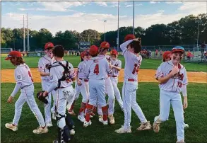  ?? Scott Ericson / Hearst Connecticu­t Media / ?? Members of the Fairfield American Little League team celebrate their 2-0 win over Ridgefield in the Section 1 championsh­ip game. Fairfield American advances to the state final four.