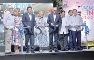  ?? KELVIN MOTA ?? Luis Abinader corta la cinta para inaugurar Vacaciones CTN Expo Feria 2022.