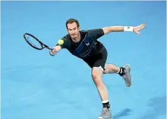  ?? GETTY IMAGES ?? Andy Murray stretches to make a forehand return during his men’s singles final loss to Russia’s Aslan Karatsev in the Sydney Tennis Classic, while below, Paula Badrosa celebrates after upsetting Barbora Krejcikova, of Czech Republic, in the women’s final.