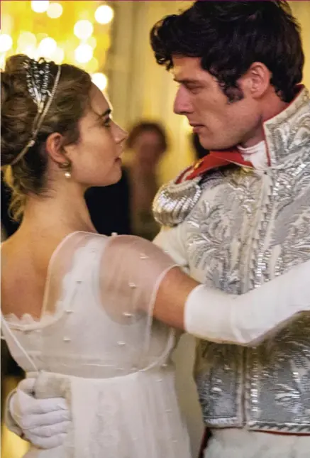  ??  ?? Flirty dancing: Dashing Prince Andrei (James Norton) gazes intently into the eyes of the beautiful Natasha