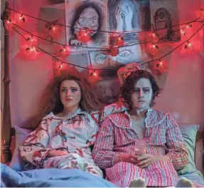  ?? PROVIDED BY MICHELE K. SHORT/FOCUS FEATURES ?? Lisa Swallows (Kathryn Newton) befriends an accidental­ly resurrecte­d Victorian corpse (Cole Sprouse) in the horror comedy “Lisa Frankenste­in.”