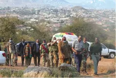  ?? ?? Members of the Zimbabwe National Army carry the body of the former Mutare Mayor, Alderman Lawrence Mudehwe to his final resting place at Manicaland Provincial Heroes Acre. — Pictures: Tinai Nyadzayo