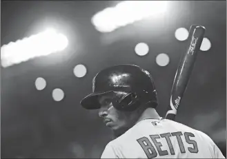  ?? PATRICK SEMANSKY/AP PHOTO ?? Boston Red Sox outfielder Mookie Betts (50) looks across the field during the first inning of the Major League Baseball All-Star Game on Tuesday in Washington.