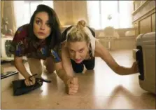  ?? HOPPER STONE — LIONSGATE VIA ASSOCIATED PRESS ?? This image released by Lionsgate shows Kate McKinnon, right, and Mila Kunis in a scene from “The Spy Who Dumped Me.”