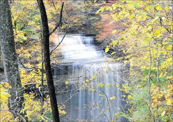  ?? OUTDOOR INDIANA MAGAZINE ?? Big Clifty State Park in Madison is known for its majestic waterfalls and scenic cliffs and canyons. It is part of the Ohio River Scenic Byway.