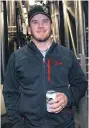  ?? JEFF BARNARD/ The Associated Press ?? 10 Barrel Brewing Co. partner Garrett Wales poses in the company’s brewery, in
Bend, Ore.