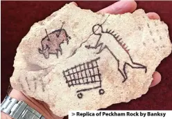  ??  ?? > Replica of Peckham Rock by Banksy