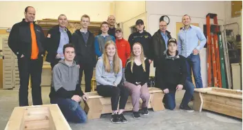  ?? [ALI WILSON / THE OBSERVER] ?? The EDSS Skills Canada carpentry team participan­ts made planter boxes from community-donated materials that will be in sold in support of the MCC. Back row: Ryan Martin, Art Janzen, Matthew Radler, Brendan Brubacher, Randy Dyck, Mathew Frey, Dylan...
