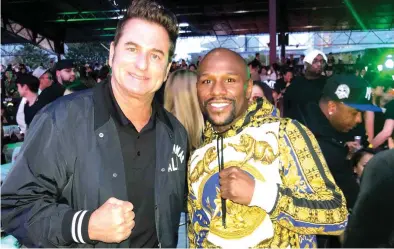  ??  ?? US boxing man Sean Gibbons, left, with Floyd Mayweather Jr. Saturday in Tokyo where the seeds of a rematch with Manny Pacquiao may have been planted. (Photo courtesy of Sean Gibbons)