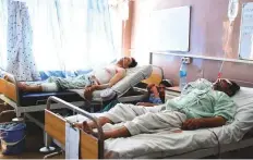  ?? AP ?? Wounded Afghans lie in hospital after a bomb attack on a local mosque in Kandahar province, yesterday.