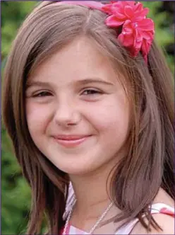  ??  ?? Mementoes: Caitlyn died of leukaemia at the age of 11 in 2011