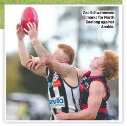  ?? ?? Zac Schwennese­n marks for North Geelong against Anakie.