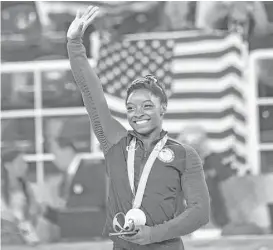  ?? Jonathan Newton / Washington Post ?? Simone Biles will compete in vault, balance beam and floor exercise over the next three days in a bid to make Olympic history.