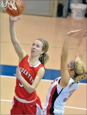  ?? For Montgomery Media / MARK C. PSORAS ?? Souderton’s Allison Gallagher puts up a shot past Thursday’s Wissahicko­n Holiday Basketball Classic action against Harriton.