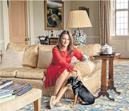  ?? ?? i Lady in red: Sophia dons a dress to relax with dog Bazza Ringo, but some have stripped before exercising their pets