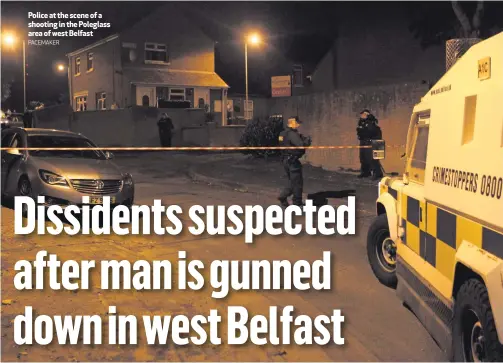  ?? PACEMAKER ?? Police at the scene of a shooting in the Poleglass area of west Belfast