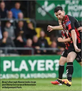  ??  ?? Bray’s Darragh Noone looks to go past Dinny Corcoran of Bohemians at Dalymount Park.