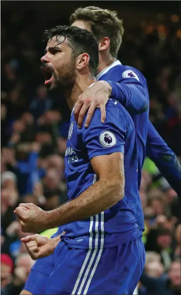  ??  ?? Diego Costa celebrates after being told what sort of salary he could command in China.