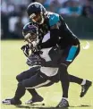  ?? Brett Coomer / Houston Chronicle ?? Former Texans cornerback A.J. Bouye, right, proved a shrewd free-agent signing for the Jaguars this season.