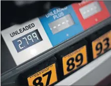  ?? [AP PHOTO] ?? Gas prices are shown at a pump in West Mifflin, Pa.