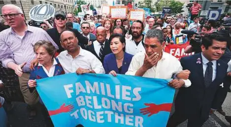  ?? AFP ?? Democrat representa­tives Joseph Crowley, Jan Schakowsky, Luis Gutierrez, John Lewis, Judy Chu and Jimmy Gomez lead a march to the headquarte­rs of US Customs and Border Protection during a protest on Wednesday, in Washington, DC.