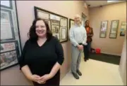  ?? JONATHAN TRESSLER — THE NEWS-HERALD ?? From front to back, Project Hope Executive Director Judy Burr, Project Hope’s Grants and Public Relations Coordinato­r John Arthur Hutchison and Felicia Anderson, a former resident at the facility, pose for a portrait Feb. 28 in a hallway there lined...