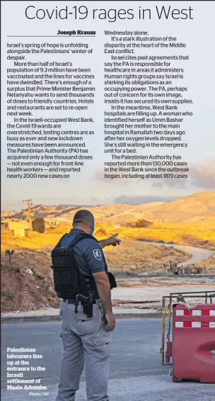  ?? Photo / AP ?? Palestinia­n labourers line up at the entrance to the Israeli settlement of Maale Adumim.