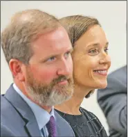  ?? Arkansas Democrat-Gazette/JOHN SYKES JR. ?? Jacob Gibbs (from left) and Maury Peterson of Hope Academy of Northwest Arkansas watch Tuesday in Little Rock as their charter school applicatio­n is approved by the Charter Authorizin­g Panel.