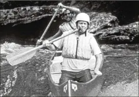  ?? FILE ?? Claude Terry (rear) guides Gov. Jimmy Carter through the whitewater of Bull Sluice on the Chattooga River. Carter became an advocate for getting the river protected.