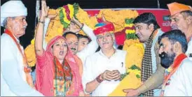  ?? ?? Union minister Gajendra Singh Shekhawat with BJP workers during a public gathering in Jodhpur.