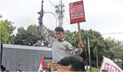  ??  ?? JAKARTA: Indonesian Muslims hold a rally outside of Myanmar embassy against ‘ethnic cleansing’ in Mynamar of Rohingya Muslims, in Jakarta. — AFP