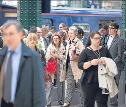 ??  ?? Passengers face further delays at Glasgow’s Queen Street, above, and other stations, according to unions